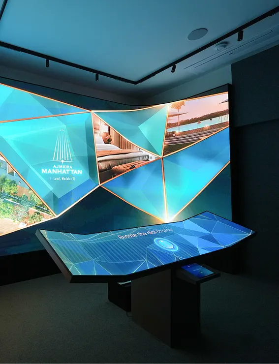 Ajmera Manhattan immersive room with curved LED and interactive display