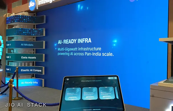 Jio AI Stack display showing AI-ready infrastructure and interactive tablet